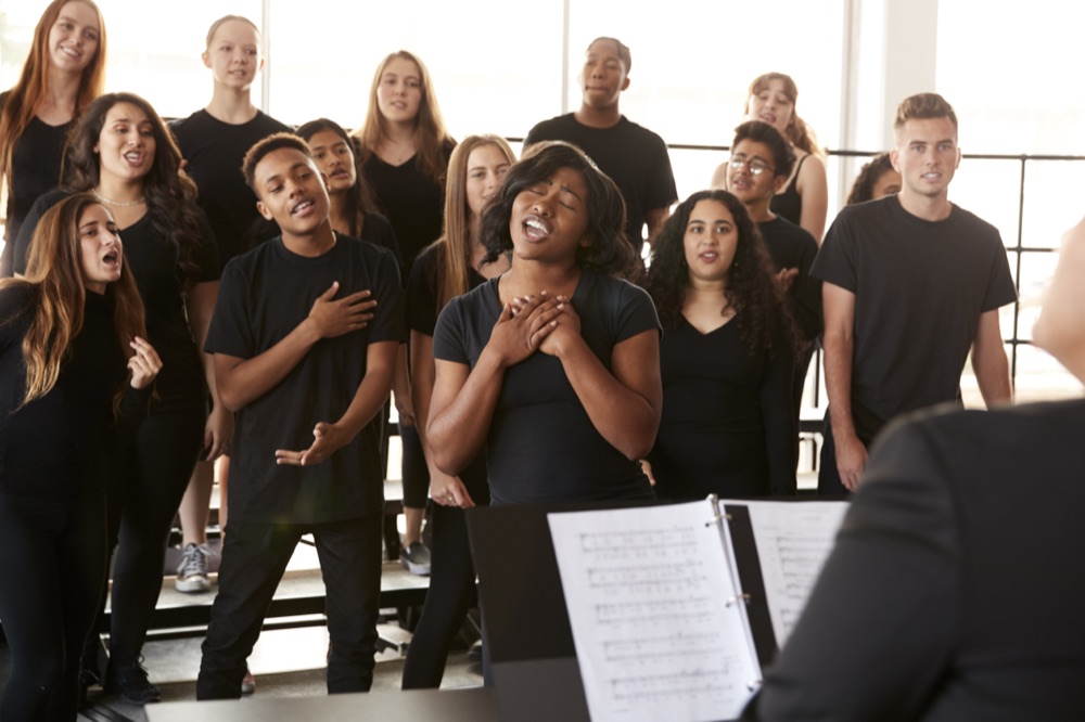 A student choir singing together